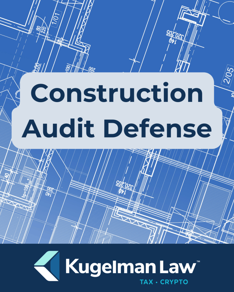 A general contractor in Riverside reviewing blueprints and financial records to prepare for a construction tax audit.